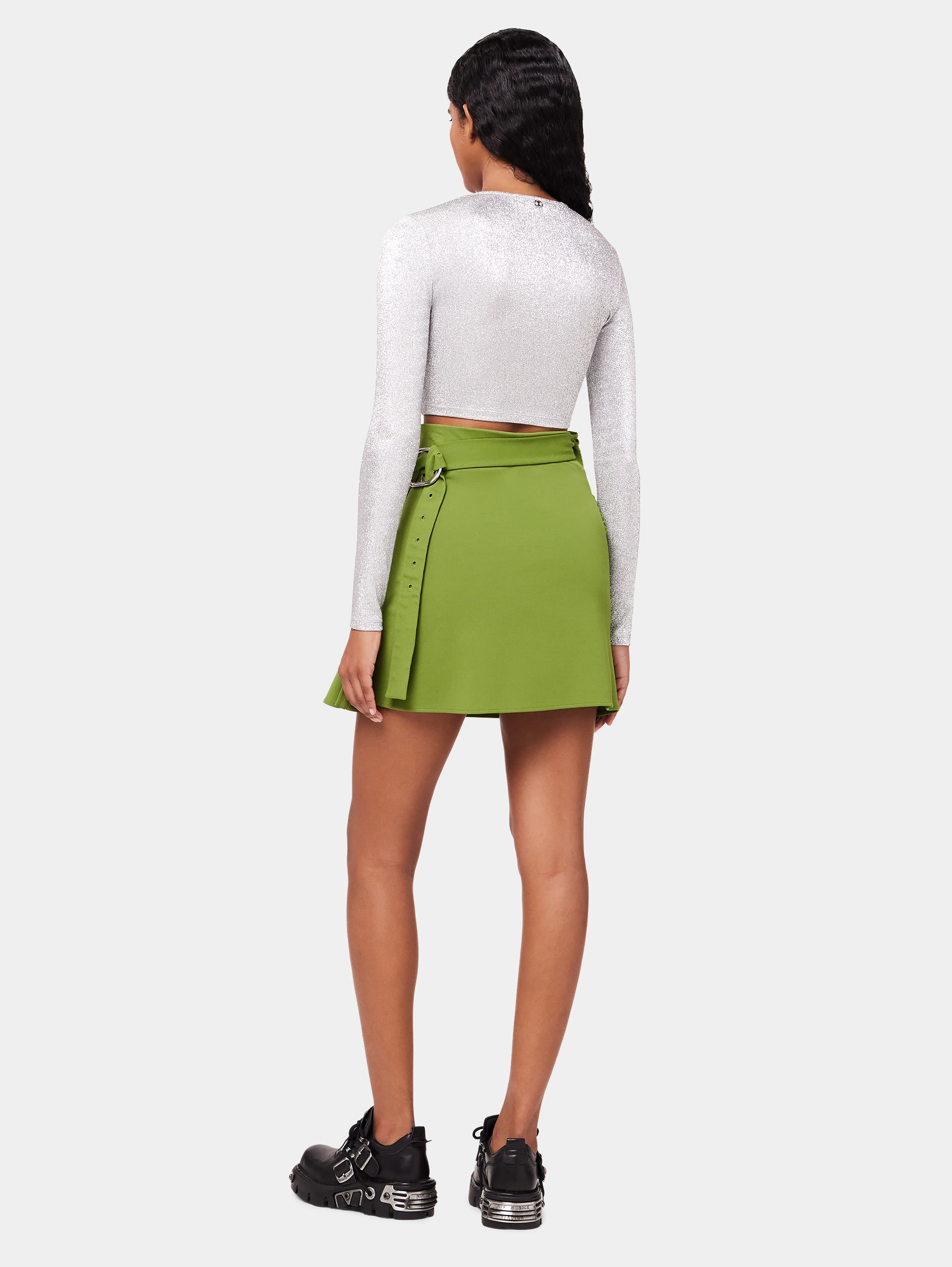 Green draped skirt with piercing detail